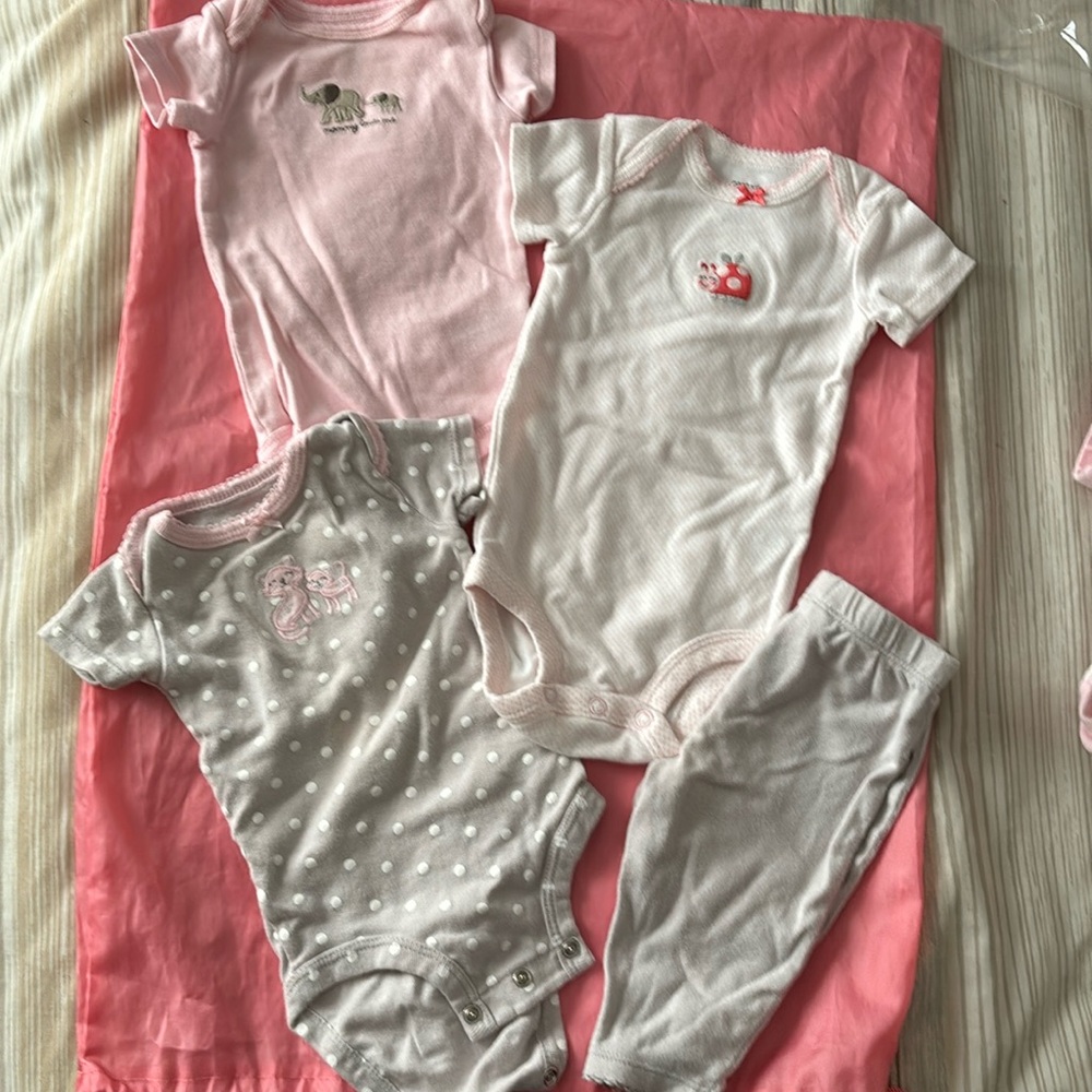 3 Carter’s snap-up onesies and one (1) polka dot hooded sweatshirt